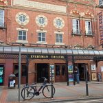 The front of the Everyman Cheltenham Theatre with a bicycle at the front of the picture