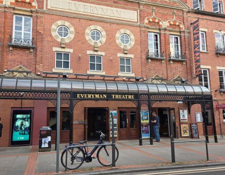 The front of the Everyman Cheltenham Theatre with a bicycle at the front of the picture