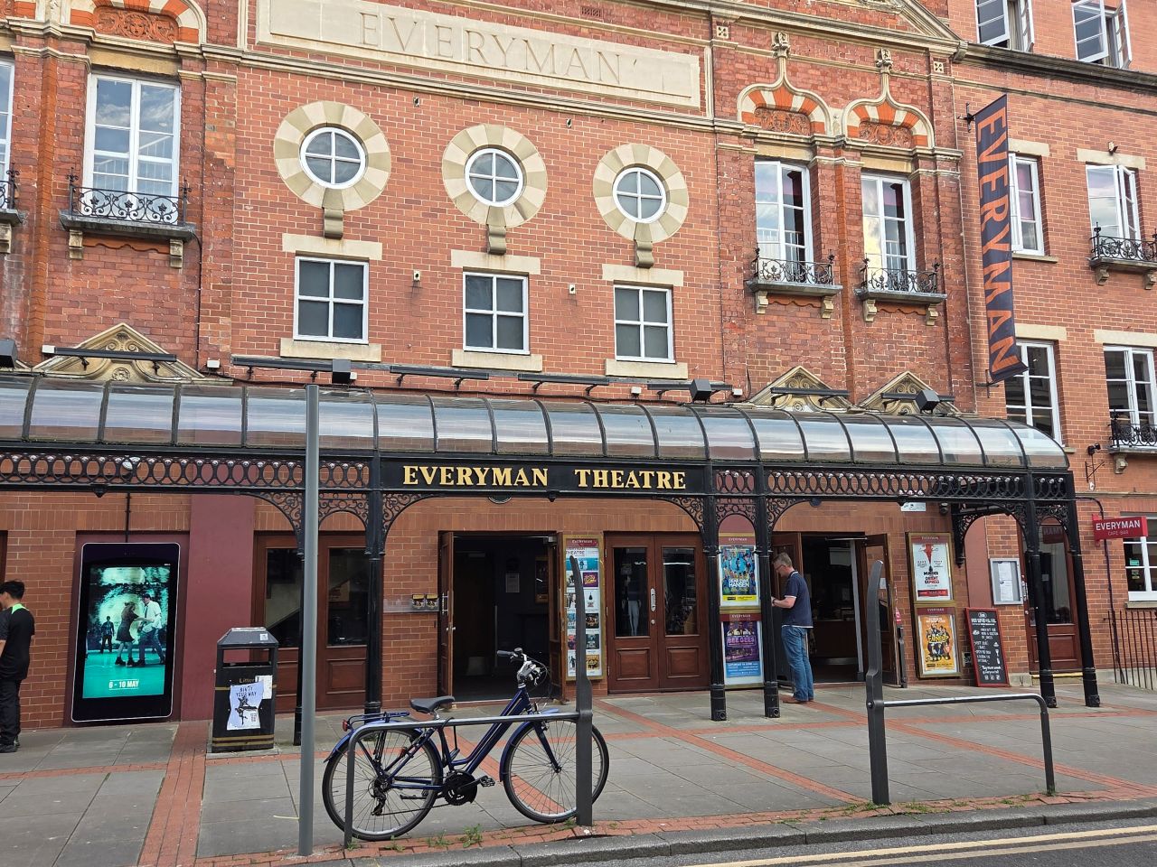 The front of the Everyman Cheltenham Theatre with a bicycle at the front of the picture