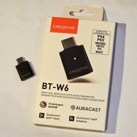 The Creative BT-W6 pictured next to the box, on a white background