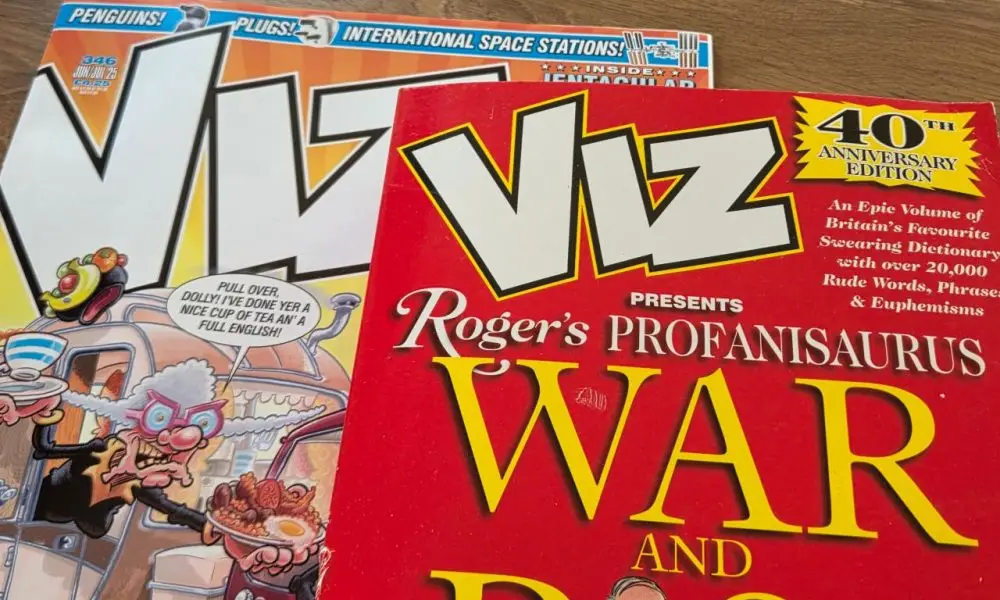 Viz Comic and a copy of Roger's Profanisaurus next to each other on a table for an article showing the problems with Google Live Transcribe