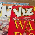 Viz Comic and a copy of Roger's Profanisaurus next to each other on a table for an article showing the problems with Google Live Transcribe