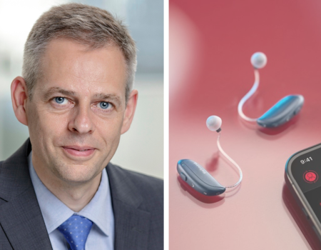 Thomas Olsgaard next to the GN Group ReSound Vivia hearing aids and the left hand corner of a mobile phone