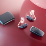 The Enzo IA hearing aids with accessories the TV Streamer + and the MultiMic+