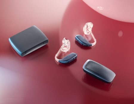 The Enzo IA hearing aids with accessories the TV Streamer + and the MultiMic+