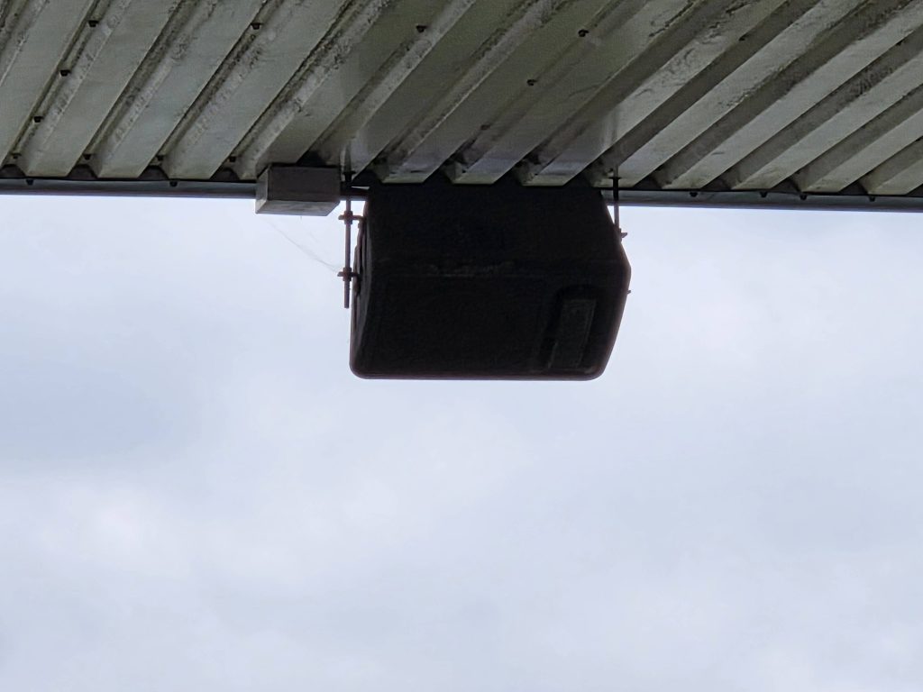 A close-up of a speaker at a football stadium