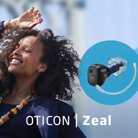 EUHA 2025: Oticon joins the Auracast revolution … and launches Google Fast Pair Oticon launch picture for Oticon Zeal featuring a happy woman dancing with her hand in the air. In a blue swoosh is a picture of the Oticon Zeal which comes with Google Fast Pair